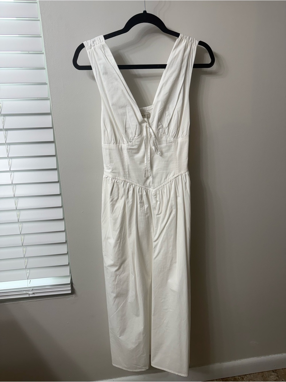 White Sleeveless Dress with Deep V Neck